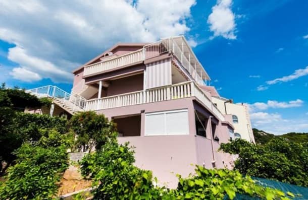 Exterior of the Apartments Care building with terraces