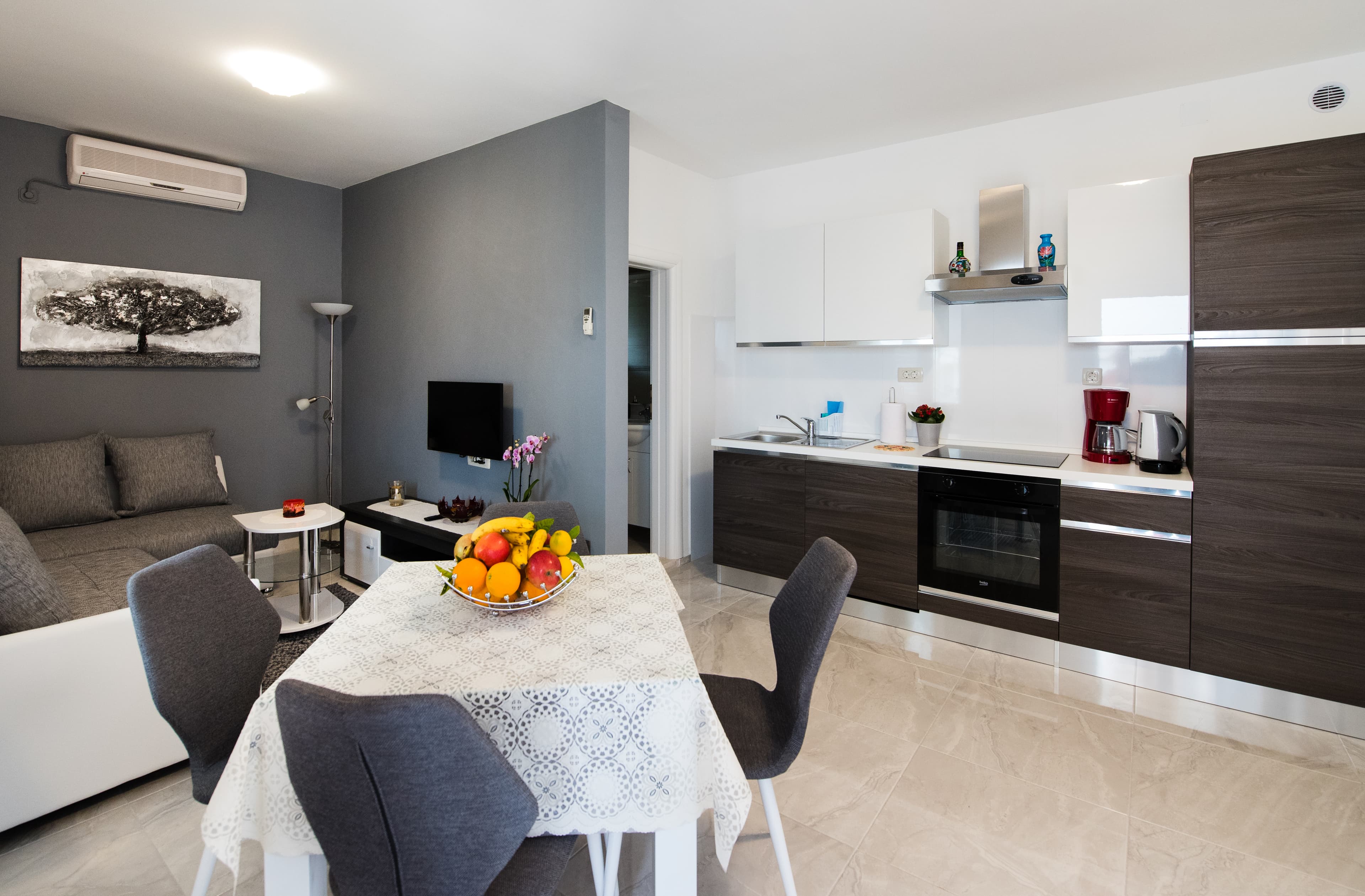 Open-plan living room and modern kitchen